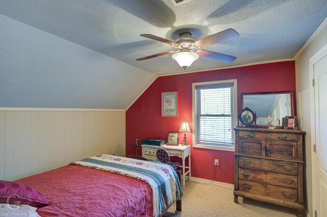 bedroom with multiple windows and crown molding