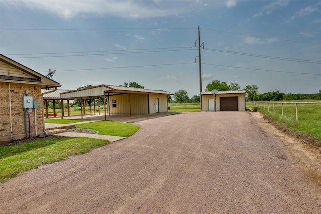 368 Hawkins Rd, Whitesboro, TX 76273 - garage with a garage and fence