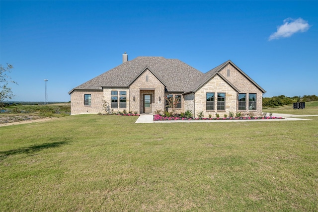 view of front facade with a front yard