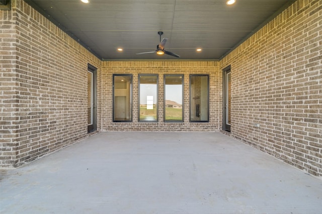 view of patio featuring ceiling fan