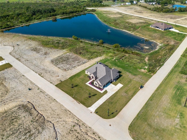 bird's eye view with a water view