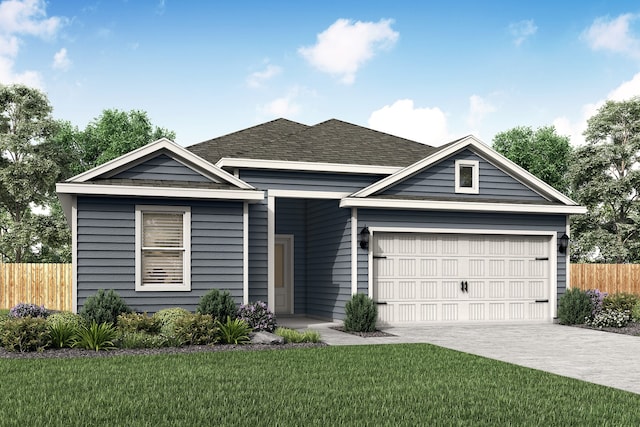 view of front of home with a front yard and a garage