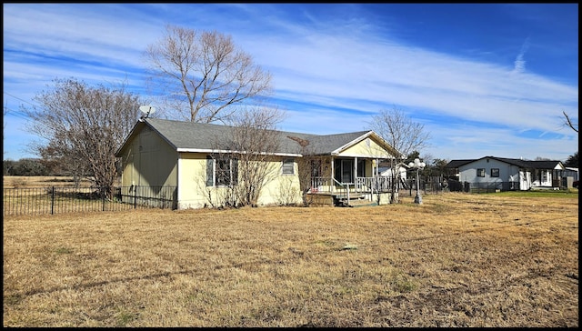 ranch-style home with a front yard