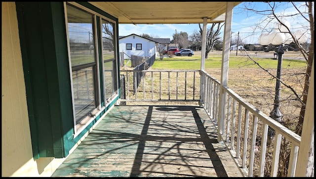 balcony featuring a porch