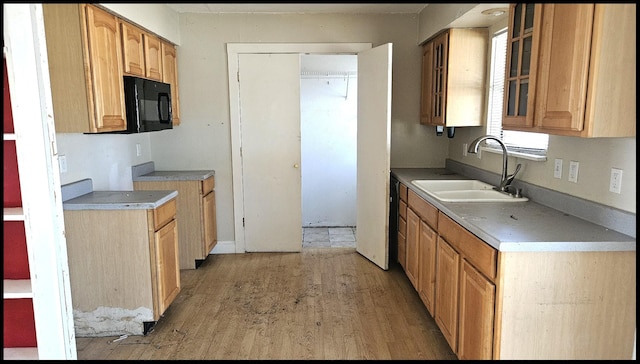 kitchen featuring light hardwood / wood-style floors and sink