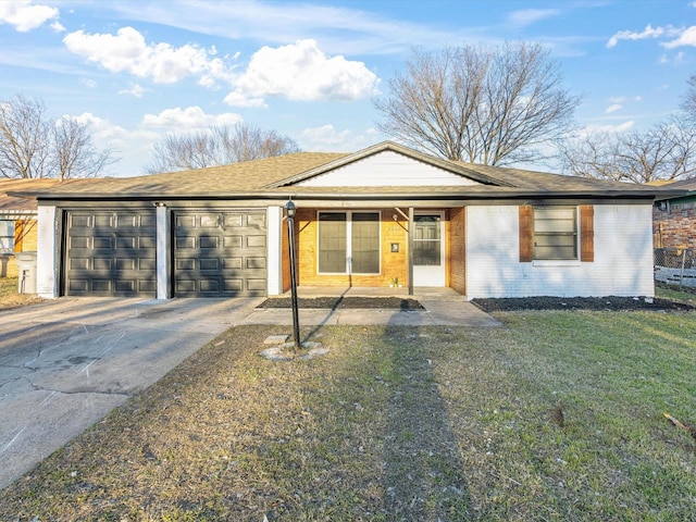 ranch-style home with a front lawn and a garage