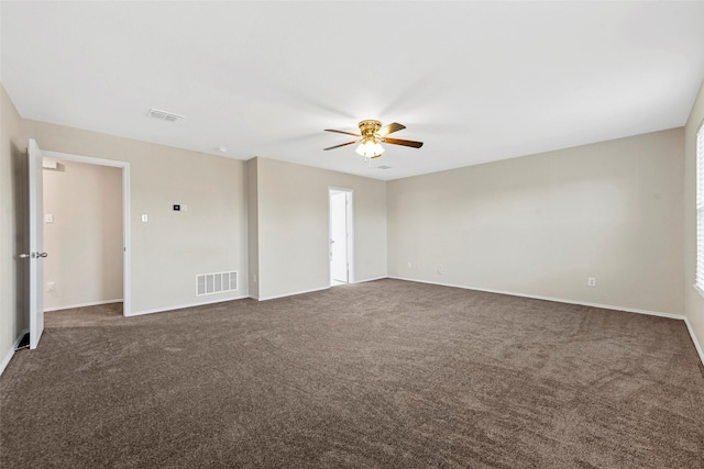 carpeted empty room featuring ceiling fan