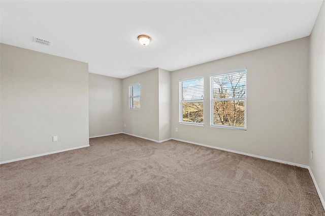 view of carpeted spare room