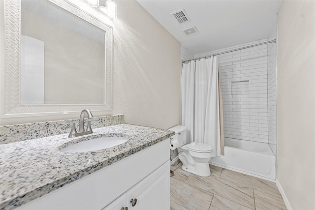 full bathroom featuring toilet, vanity, and shower / tub combo with curtain