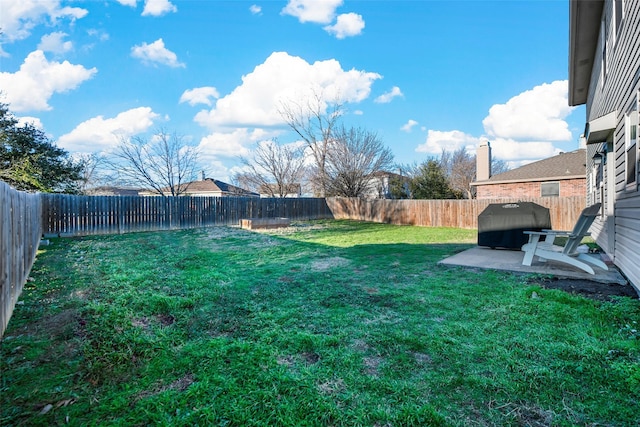 view of yard with a patio area