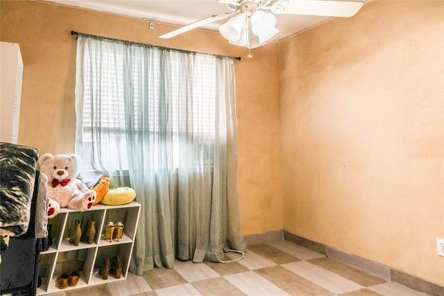 recreation room with ceiling fan