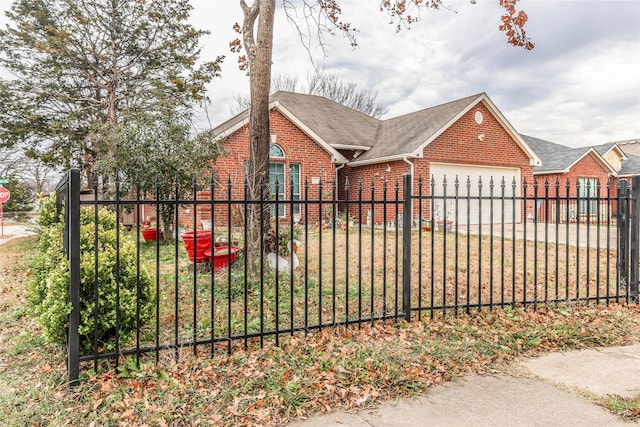 view of side of property featuring a garage and a yard