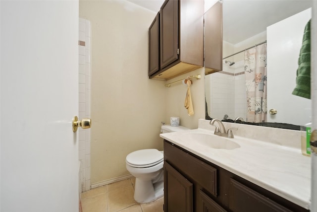 bathroom with toilet, vanity, tile patterned flooring, and curtained shower