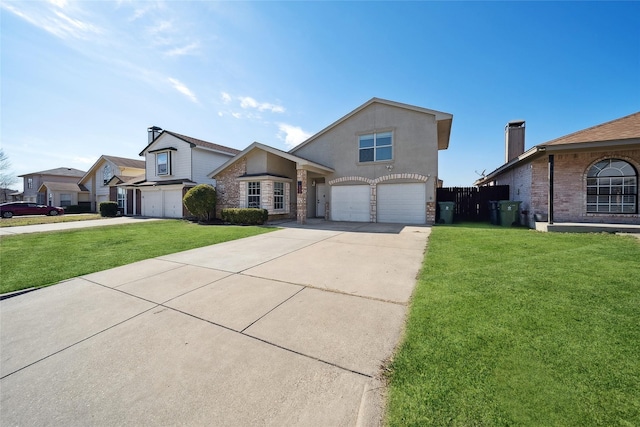 view of front property with a front lawn and a garage