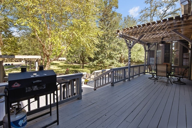 wooden terrace featuring a pergola and outdoor dining area