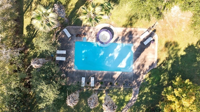 drone / aerial view of a pool area