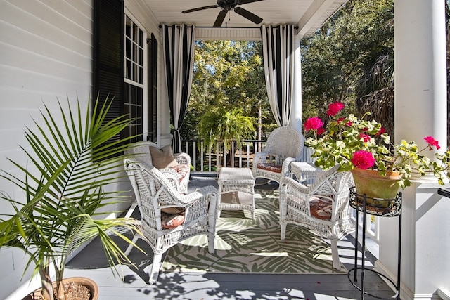 balcony featuring ceiling fan and covered porch