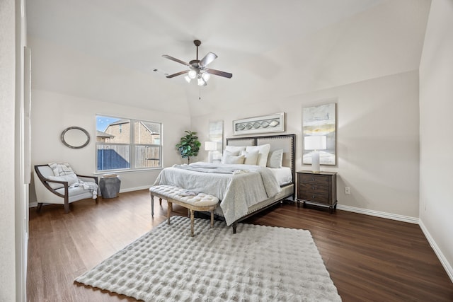 bedroom featuring lofted ceiling, dark hardwood / wood-style floors, and ceiling fan