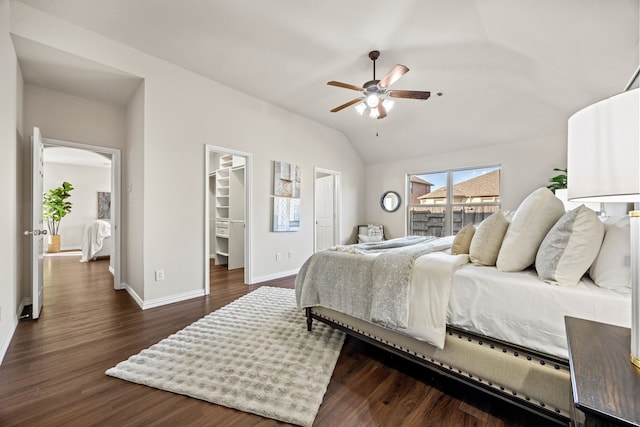 bedroom featuring ceiling fan, dark hardwood / wood-style flooring, access to outside, a spacious closet, and a closet