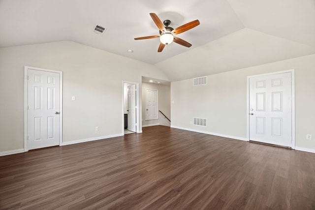 interior space with ceiling fan, dark wood-type flooring, and lofted ceiling