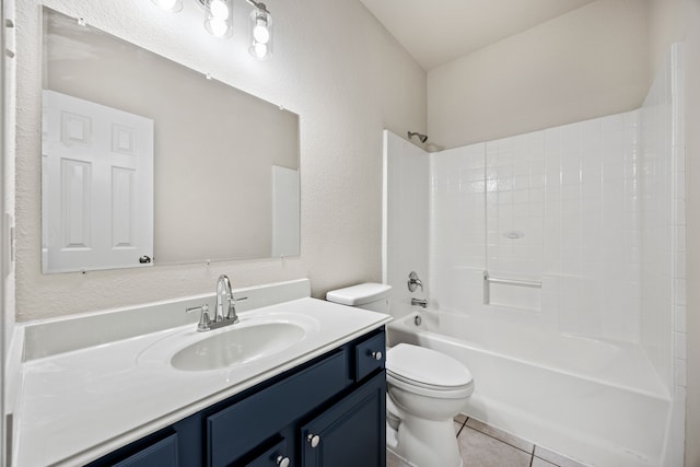 full bathroom featuring toilet, washtub / shower combination, tile patterned floors, and vanity