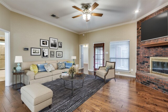 empty room featuring ceiling fan, dark hardwood / wood-style floors, and ornamental molding