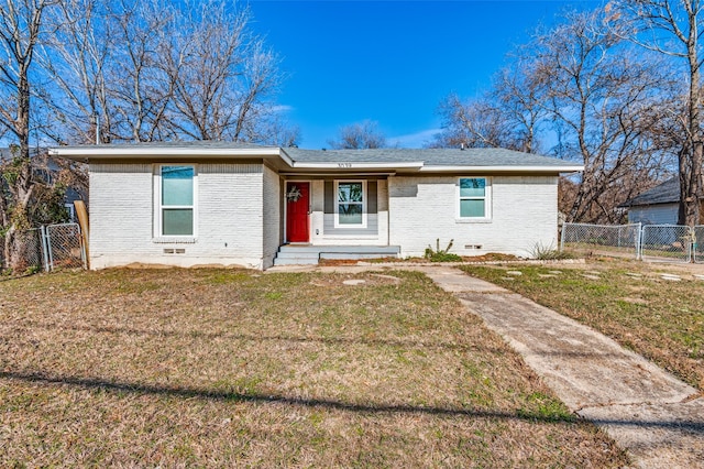 ranch-style house featuring a front lawn