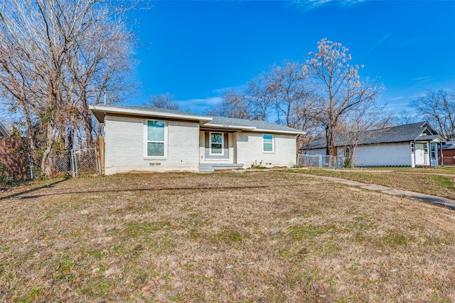 ranch-style house with a front yard