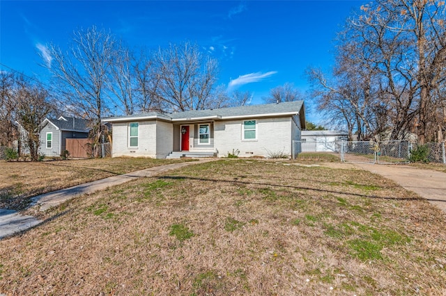 ranch-style house with a front yard