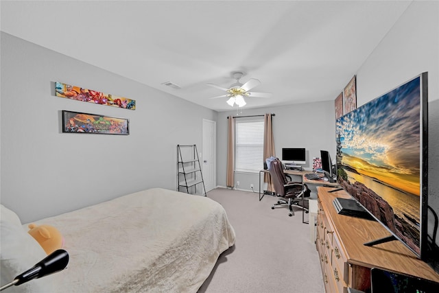 bedroom with light colored carpet and ceiling fan