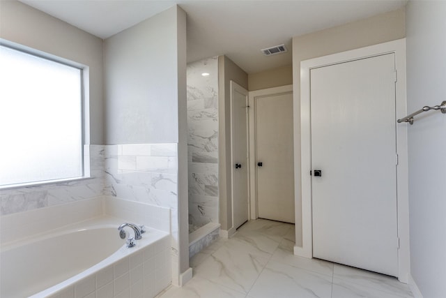 bathroom with a shower