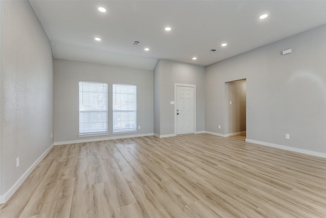 unfurnished room featuring light hardwood / wood-style floors