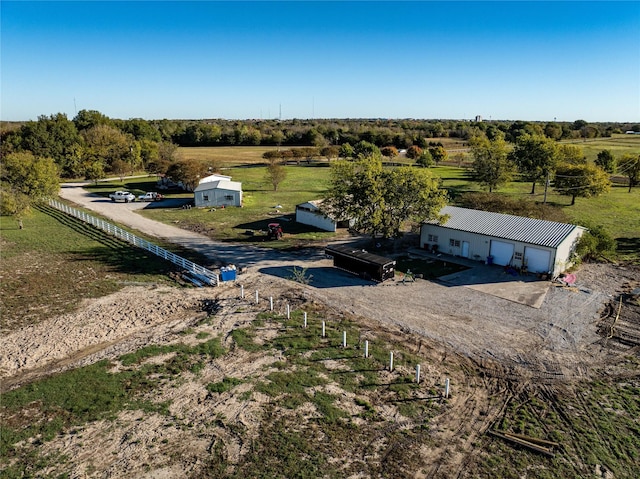 birds eye view of property featuring a rural view