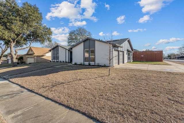 single story home with a garage