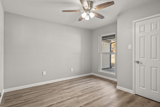 unfurnished bedroom featuring ceiling fan and light hardwood / wood-style floors