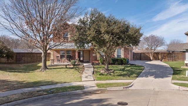 view of front of home featuring a front yard