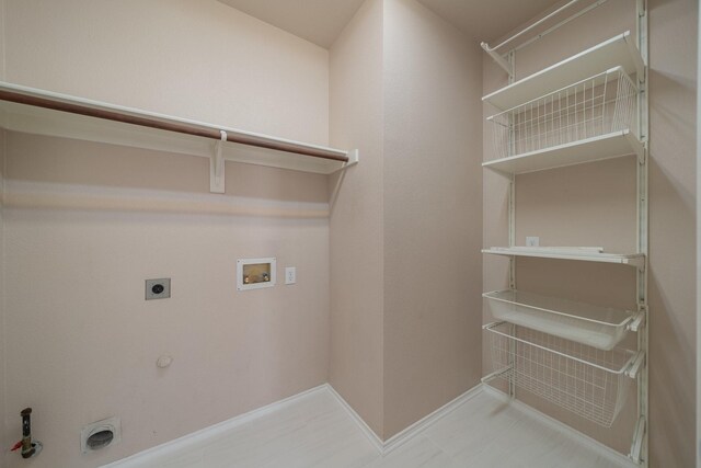 bathroom featuring lofted ceiling, vanity, and a tub