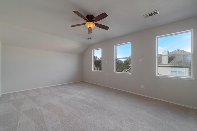 unfurnished bedroom featuring ceiling fan and light carpet