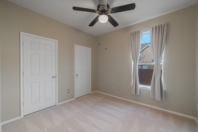 full bathroom with toilet, vanity, and tiled shower / bath