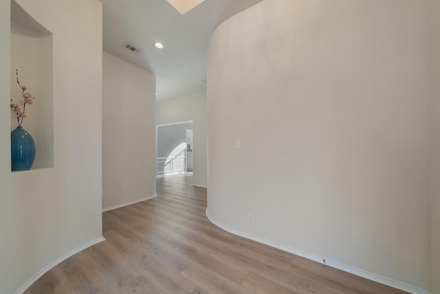 corridor featuring light hardwood / wood-style flooring