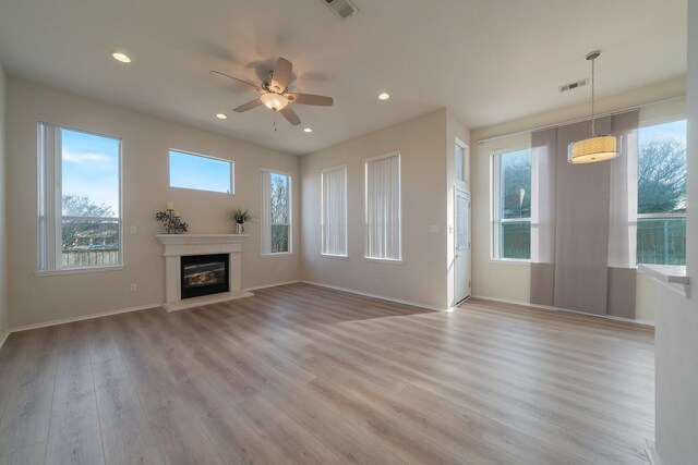 unfurnished room with wood-type flooring, ornamental molding, a chandelier, and vaulted ceiling