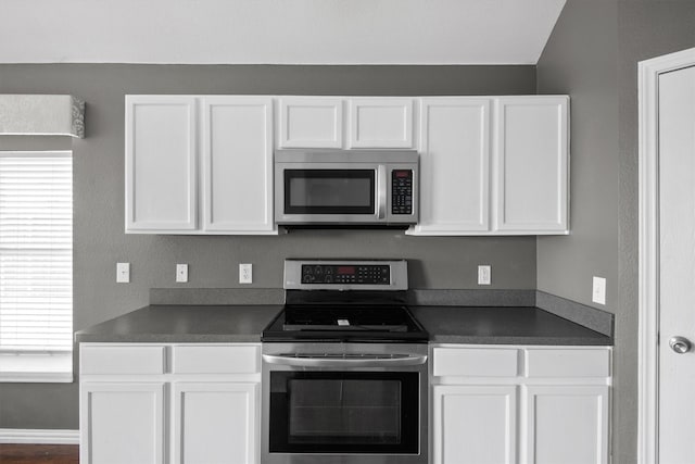 kitchen featuring white cabinetry and stainless steel appliances