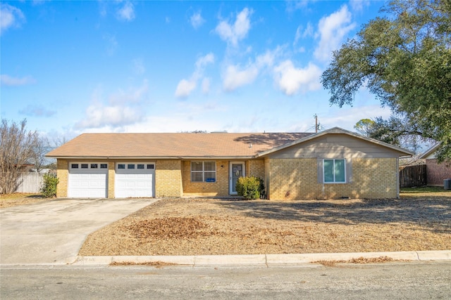 single story home featuring a garage