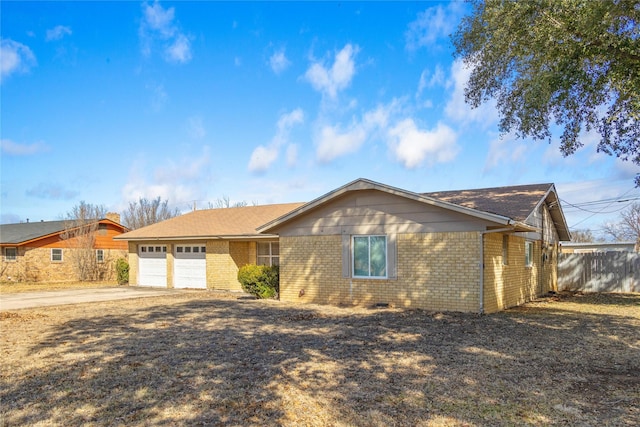 single story home with a garage