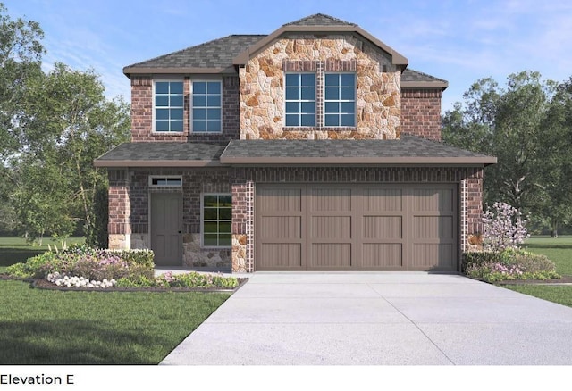 view of front of home featuring a front yard and a garage