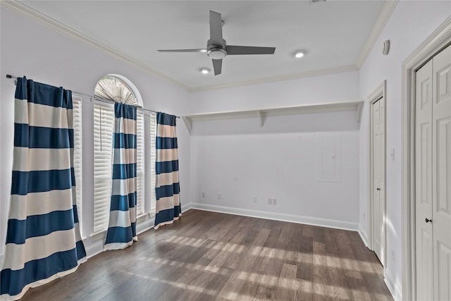 unfurnished bedroom featuring ceiling fan, dark wood-type flooring, and ornamental molding