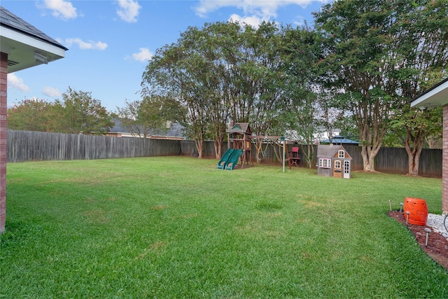 view of yard with a playground