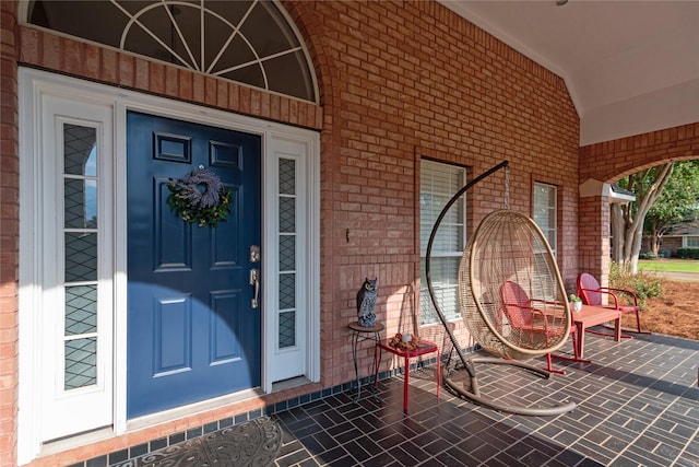 doorway to property with covered porch