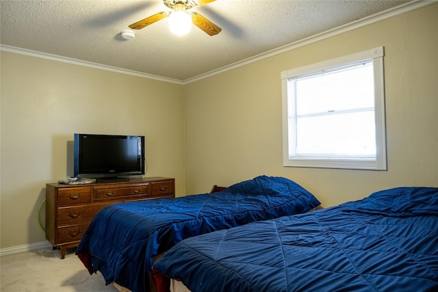 carpeted bedroom featuring ceiling fan, crown molding, and a textured ceiling