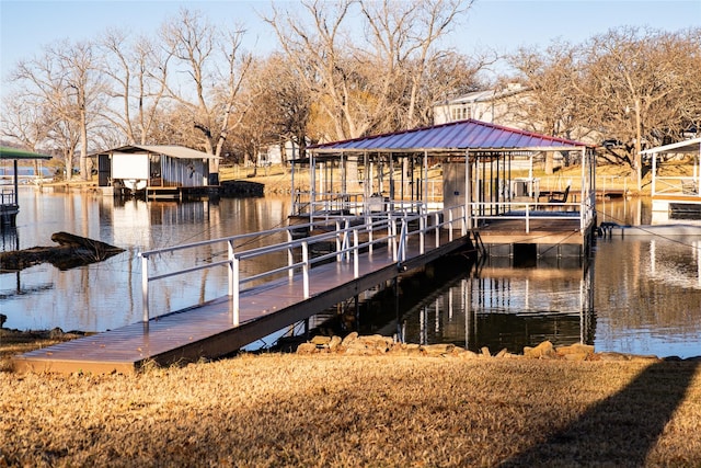 dock area with a water view